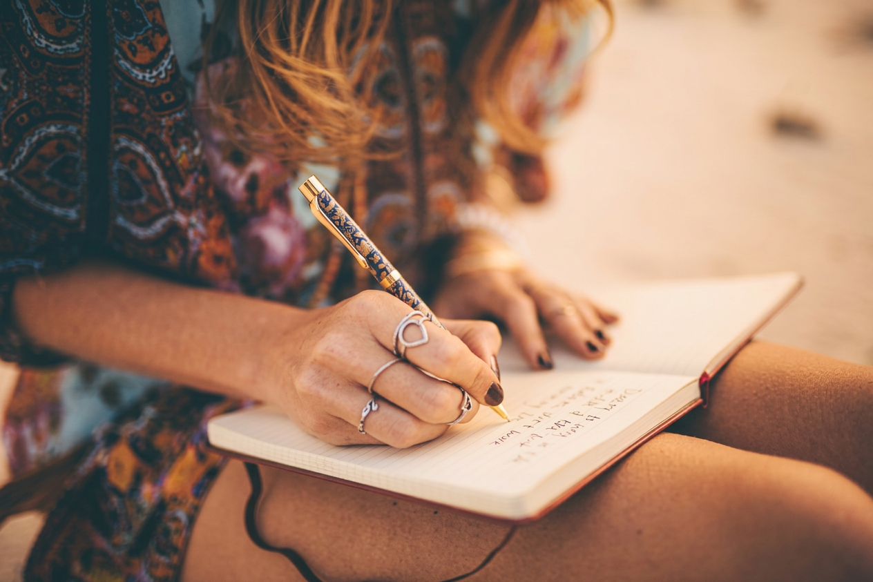 Person journaling representing personalized doula support in Victoria BC